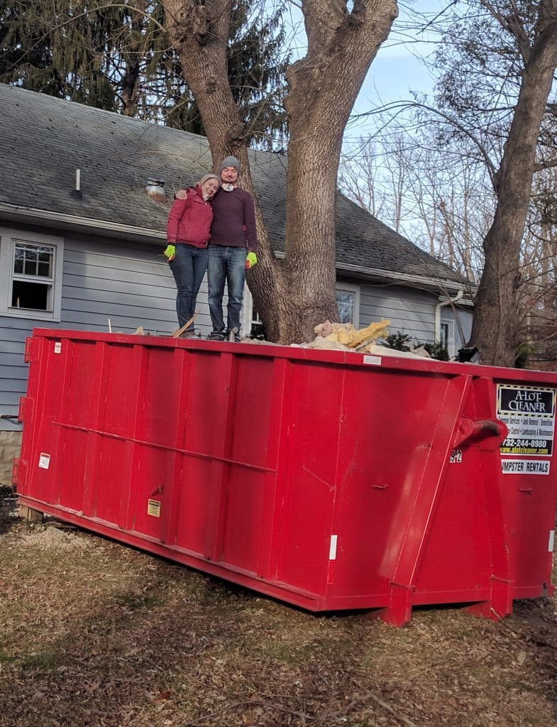 Overloaded dumpster, full garbage container, household garbage b